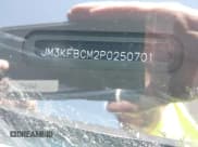 ✅ 2023 Mazda CX-5 S Carbon Edition • VIN: JM3KFBCM2P0250701 • Lot: 42272818. Listed on IAAI with 11,949 mi. Free auction sales archive from the USA and detailed vehicle history report at DreamBid. Image 9.