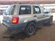✅ 2001 Jeep Grand Cherokee Laredo • VIN: 1J4GX48S21C648442 • Lot: 42023940. Listed on IAAI with 202,630 mi. Free auction sales archive from the USA and detailed vehicle history report at DreamBid. Image 4.