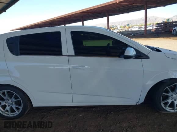 2013 Chevrolet Sonic LT with VIN 1G1JD6SBXD4222966, listed as a IAAI auction lot 42575707 with 140,605 mi miles and . Bid and sale history available at DreamBid. Image 13.