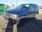 ✅ 2001 Jeep Grand Cherokee Laredo • VIN: 1J4GW48S01C699585 • Lot: 43744180. Listed on IAAI with 219,402 mi. Free auction sales archive from the USA and detailed vehicle history report at DreamBid. Image 2.
