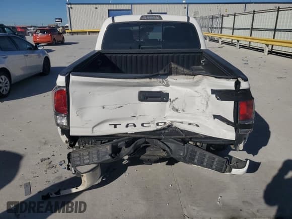✅ 2020 Toyota Tacoma SR5 • VIN: 5TFAZ5CN4LX087931 • Lot: 82699655. Listed on Copart with 83,443 mi. Free auction sales archive from the USA and detailed vehicle history report at DreamBid. Image 6.