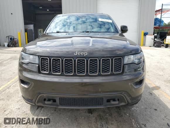2016 Jeep Grand Cherokee Limited 75th Anniversary с VIN 1C4RJFBG9GC410970, выставлен на аукционе Copart как лот 70992975 с пробегом 248 495 миль миль и Списание • Salvage title. История ставок и продаж доступна на DreamBid. Изображение 5.