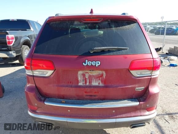 ✅ 2015 Jeep Grand Cherokee Summit • VIN: 1C4RJEJG9FC100568 • Lot: 42512705. Listed on IAAI with 128,413 mi. Free auction sales archive from the USA and detailed vehicle history report at DreamBid. Image 16.