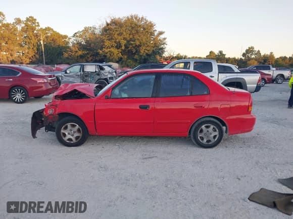 ✅ 2005 Hyundai Accent GLS • VIN: KMHCG45C25U592709 • Лот: 43434084. Опубликован ранее на IAAI с пробегом 122 038 миль. Бесплатный доступ к архиву аукционных продаж из США и подробный отчёт об истории автомобиля на DreamBid. Изображение 15.