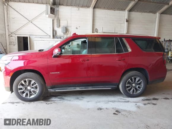 ✅ 2021 Chevrolet Tahoe LT • VIN: 1GNSKNKD4MR334864 • Lot: 42570802. Listed on IAAI with 74,038 mi. Free auction sales archive from the USA and detailed vehicle history report at DreamBid. Image 14.