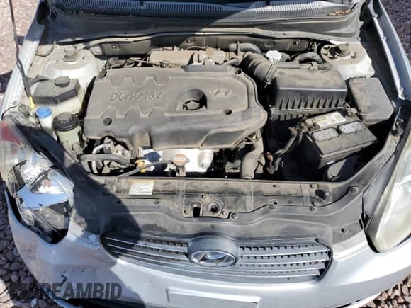 2008 Hyundai Accent GLS z VIN KMHCN46C98U240090, wystawiony jako Copart lot #77001554 z przebiegiem 125 897 mil mil oraz Szkoda całkowita • Salvage title. Historia ofert i sprzedaży dostępna na DreamBid. Obrazek 11.