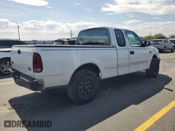 ✅ 1997 Ford F-150 XL • VIN: 1FTEX17L9VKB79741 • Lot: 60880145. Listed on Copart with 163,643 mi. Free auction sales archive from the USA and detailed vehicle history report at DreamBid. Image 3.