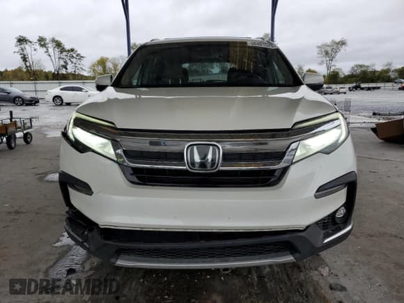 ✅ 2019 Honda Pilot Touring 8-Passenger • VIN: 5FNYF5H98KB033740 • Lot: 90401525. Listed on Copart with 91,251 mi. Free auction sales archive from the USA and detailed vehicle history report at DreamBid. Image 5.