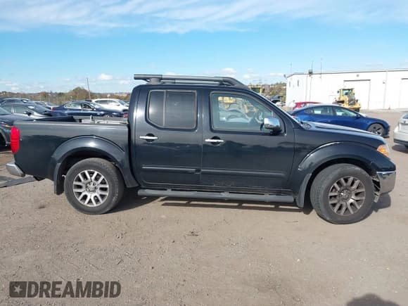 ✅ 2011 Nissan Frontier Pro-4X • VIN: 1N6AD0EV5BC442204 • Lot: 43482225. Listed on IAAI with 177,990 mi. Free auction sales archive from the USA and detailed vehicle history report at DreamBid. Image 13.