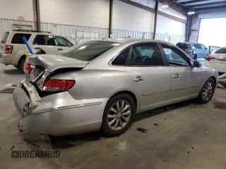 2007 Hyundai Azera SE z VIN KMHFC46F57A243839, wystawiony jako Copart lot #47177895 z przebiegiem 271 350 mil mil oraz Szkoda całkowita • Salvage title. Historia ofert i sprzedaży dostępna na DreamBid. Obrazek 3.
