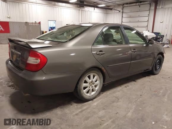 ✅ 2004 Toyota Camry XLE • VIN: 4T1BE32K74U790658 • Лот: 43116665. Опубликован ранее на IAAI с пробегом 246 808 миль. Бесплатный доступ к архиву аукционных продаж из США и подробный отчёт об истории автомобиля на DreamBid. Изображение 4.