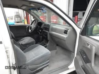 ✅ 2004 Isuzu Rodeo S • VIN: 4S2CK58W244301482 • Lot: 43614335. Wystawiony na IAAI z przebiegiem 163 277 mil. Bezpłatny archiwum sprzedaży aukcyjnych z USA i szczegółowy raport historii pojazdu na DreamBid. Zdjęcie 5.