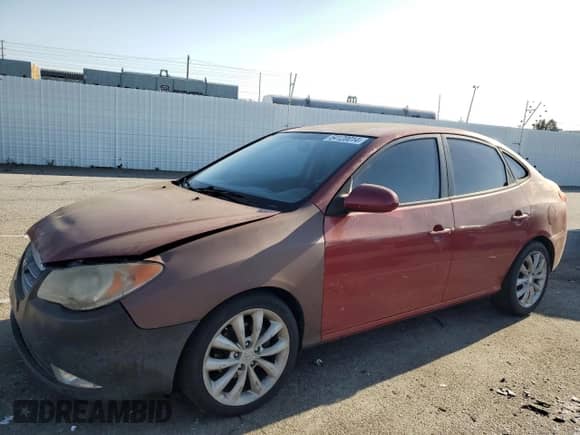 2009 Hyundai Elantra GLS with VIN KMHDU46D69U604127, listed as a Copart auction lot 64120014 with 172,040 mi miles and Salvage title. Bid and sale history available at DreamBid. Image 1.
