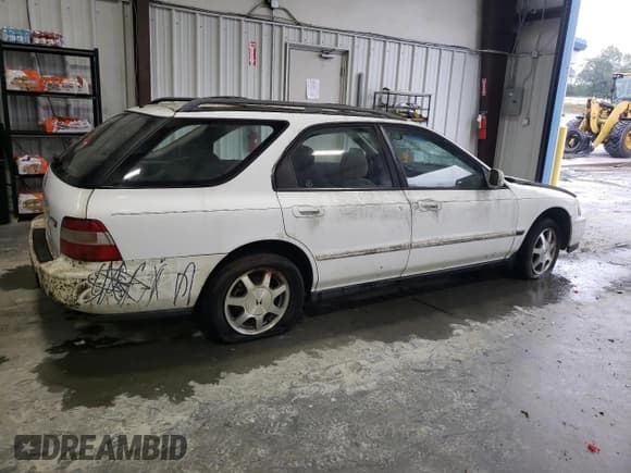 ✅ 1995 Honda Accord EX • VIN: 1HGCE1897SA010756 • Lot: 65445975. Listed on Copart with 54,064 mi. Free auction sales archive from the USA and detailed vehicle history report at DreamBid. Image 3.