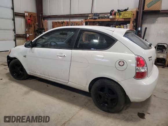 2009 Hyundai Accent L with VIN KMHCN35C69U144768, listed as a Copart auction lot 78474104 with 260,904 mi miles and Salvage title. Bid and sale history available at DreamBid. Image 2.