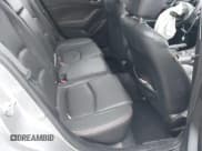 ✅ 2014 Mazda 3 S Grand Touring • VIN: JM1BM1W36E1206915 • Lot: 42315062. Listed on IAAI with 157,945 mi. Free auction sales archive from the USA and detailed vehicle history report at DreamBid. Image 8.