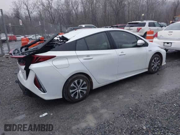 ✅ 2022 Toyota Prius XLE • VIN: JTDKAMFP4N3202279 • Lot: 43688179. Listed on IAAI with 62,855 mi. Free auction sales archive from the USA and detailed vehicle history report at DreamBid. Image 4.