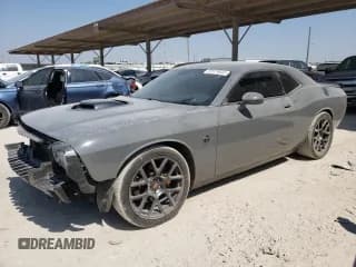 ✅ 2018 Dodge Challenger T/A • VIN: 2C3CDZBT5JH195012 • Lot: 63579643. Wystawiony na Copart z przebiegiem 102 498 mil. Bezpłatny archiwum sprzedaży aukcyjnych z USA i szczegółowy raport historii pojazdu na DreamBid. Zdjęcie 1.