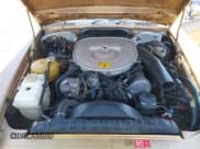 ✅ 1984 Mercedes-Benz 380 SL • VIN: WDBBA45AXEA012235 • Лот: 43484647. Опубликован ранее на IAAI с пробегом 169 485 миль. Бесплатный доступ к архиву аукционных продаж из США и подробный отчёт об истории автомобиля на DreamBid. Изображение 10.