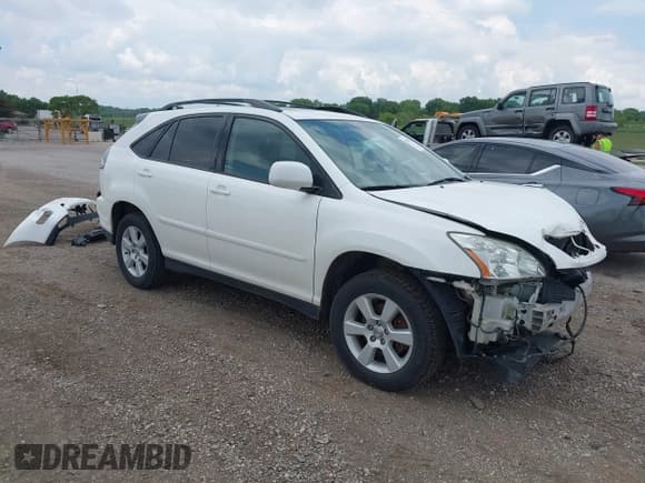✅ 2007 Lexus RX 350 • VIN: 2T2HK31U37C034199 • Lot: 42245321. Listed on IAAI with 185,077 mi. Free auction sales archive from the USA and detailed vehicle history report at DreamBid. Image 1.
