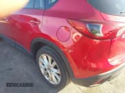 ✅ 2014 Mazda CX-5 Grand Touring • VIN: JM3KE4DY0E0363009 • Lot: 43713061. Listed on IAAI with 105,703 mi. Free auction sales archive from the USA and detailed vehicle history report at DreamBid. Image 6.