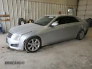 ✅ 2014 Cadillac ATS Luxury RWD • VIN: 1G6AB5R30E0187873 • Lot: 53679645. Listed on Copart with 128,770 mi. Free auction sales archive from the USA and detailed vehicle history report at DreamBid. Image 1.