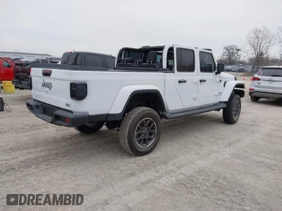 ✅ 2023 Jeep Gladiator Overland • VIN: 1C6HJTFG6PL516742 • Lot: 41565864. Listed on IAAI with Not provided. Free auction sales archive from the USA and detailed vehicle history report at DreamBid. Image 4.