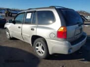 ✅ 2005 GMC Envoy SLE • VIN: 1GKDT13S452194933 • Lot: 41426512. Listed on IAAI with 176,897 mi. Free auction sales archive from the USA and detailed vehicle history report at DreamBid. Image 3.