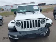 ✅ 2021 Jeep Wrangler Unlimited Sahara • VIN: 1C4HJXEG4MW748395 • Lot: 43569883. Listed on IAAI with 93,704 mi. Free auction sales archive from the USA and detailed vehicle history report at DreamBid. Image 12.