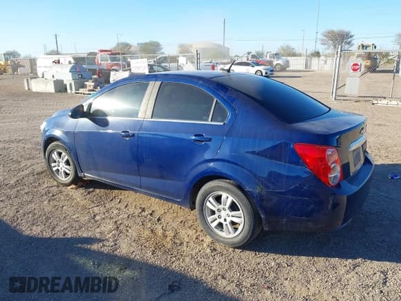 ✅ 2014 Chevrolet Sonic LT • VIN: 1G1JC5SH2E4151507 • Lot: 43611838. Listed on IAAI with 97,460 mi. Free auction sales archive from the USA and detailed vehicle history report at DreamBid. Image 3.
