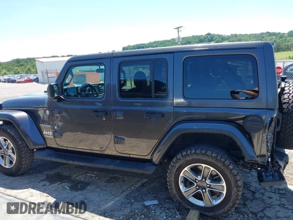 ✅ 2021 Jeep Wrangler Unlimited Sahara • VIN: 1C4HJXEN3MW592235 • Lot: 42690167. Listed on IAAI with 103,351 mi. Free auction sales archive from the USA and detailed vehicle history report at DreamBid. Image 14.