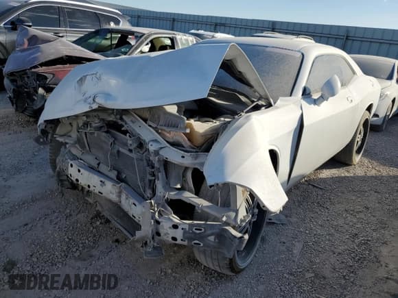 ✅ 2013 Dodge Challenger SXT • VIN: 2C3CDYAG5DH670273 • Lot: 67798934. Wystawiony na Copart z przebiegiem Nie podano. Bezpłatny archiwum sprzedaży aukcyjnych z USA i szczegółowy raport historii pojazdu na DreamBid. Zdjęcie 1.