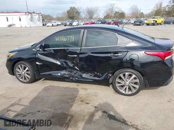 ✅ 2022 Hyundai Accent Limited • VIN: 3KPC34A62NE170759 • Lot: 41886779. Listed on IAAI with 34,474 mi. Free auction sales archive from the USA and detailed vehicle history report at DreamBid. Image 13.