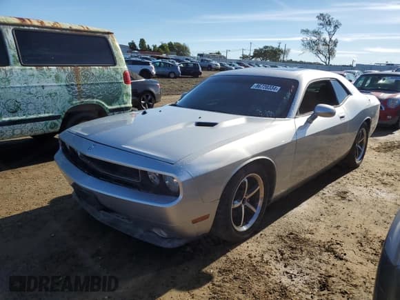 ✅ 2009 Dodge Challenger SE • VIN: 2B3LJ44V59H561537 • Lot: 86720334. Wystawiony na Copart z przebiegiem 163 233 mil. Bezpłatny archiwum sprzedaży aukcyjnych z USA i szczegółowy raport historii pojazdu na DreamBid. Zdjęcie 1.