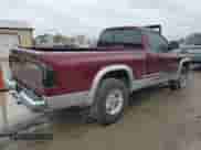 2000 Dodge Dakota Sport z VIN 1B7GG26N8YS795890, wystawiony jako Copart lot #78523764 z przebiegiem 214 933 mil mil oraz Szkoda całkowita • Salvage title. Historia ofert i sprzedaży dostępna na DreamBid. Obrazek 3.