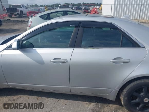 ✅ 2009 Cadillac CTS RWD • VIN: 1G6DF577690161579 • Lot: 42651953. Wystawiony na IAAI z przebiegiem 103 168 mil. Bezpłatny archiwum sprzedaży aukcyjnych z USA i szczegółowy raport historii pojazdu na DreamBid. Zdjęcie 14.