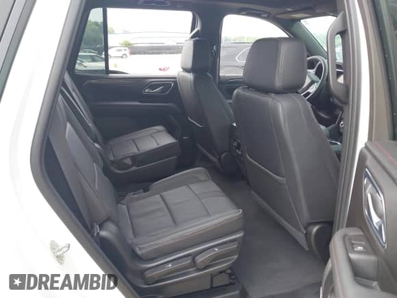 2023 Chevrolet Tahoe RST z VIN 1GNSKRKD7PR506168, wystawiony jako IAAI lot #42833878 z przebiegiem Nie podano mil oraz . Historia ofert i sprzedaży dostępna na DreamBid. Obrazek 8.