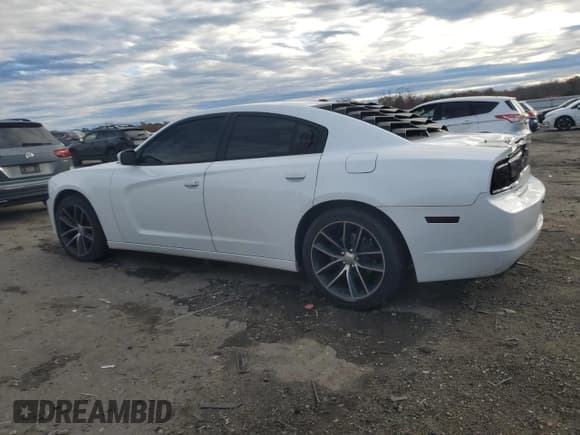 ✅ 2013 Dodge Charger SE • VIN: 2C3CDXBG6DH543671 • Lot: 92074325. Listed on Copart with 155,729 mi. Free auction sales archive from the USA and detailed vehicle history report at DreamBid. Image 2.