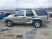 1999 Chevrolet Blazer LT z VIN 1GNDT13W3X2250496, wystawiony jako IAAI lot #42001807 z przebiegiem 210 193 mil mil oraz . Historia ofert i sprzedaży dostępna na DreamBid. Obrazek 14.