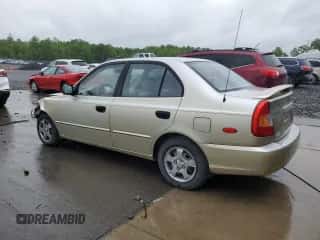 2002 Hyundai Accent GL with VIN KMHCG45C12U355561, listed as a Copart auction lot 54546945 with 22,893 mi miles and Salvage title. Bid and sale history available at DreamBid. Image 2.