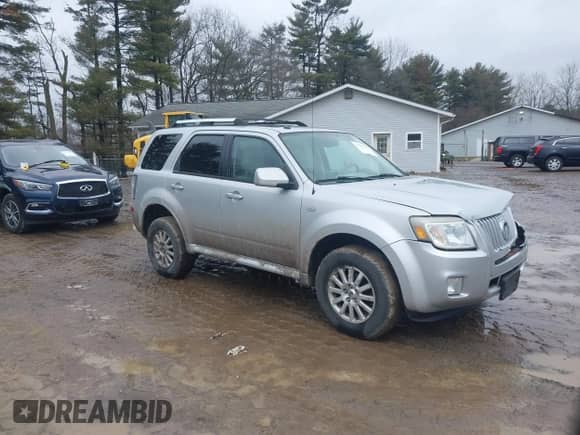 2009 Mercury Mariner Premier with VIN 4M2CU97719KJ15260, listed as a IAAI auction lot 41500367 with 104,063 mi miles and . Bid and sale history available at DreamBid. Image 1.