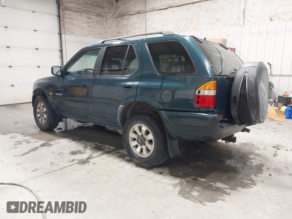 ✅ 1998 Honda Passport LX • VIN: 4S6CM58W9W4419797 • Lot: 42425697. Listed on IAAI with 158,562 mi. Free auction sales archive from the USA and detailed vehicle history report at DreamBid. Image 3.