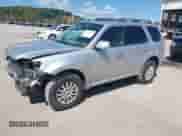 2010 Mercury Mariner Premier z VIN 4M2CN9HGXAKJ16116, wystawiony jako IAAI lot #43140056 z przebiegiem 194 370 mil mil oraz . Historia ofert i sprzedaży dostępna na DreamBid. Obrazek 2.