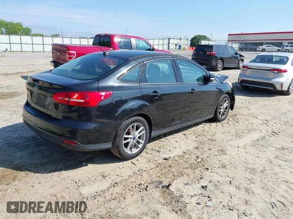 ✅ 2015 Ford Focus SE • VIN: 1FADP3F20FL207640 • Lot: 42219691. Listed on IAAI with 154,003 mi. Free auction sales archive from the USA and detailed vehicle history report at DreamBid. Image 4.