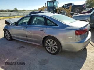 ✅ 2018 Audi A6 Premium Plus • VIN: WAUD8AFC5JN036091 • Лот: 90885665. Опубликован ранее на Copart с пробегом 128 167 миль. Бесплатный доступ к архиву аукционных продаж из США и подробный отчёт об истории автомобиля на DreamBid. Изображение 2.