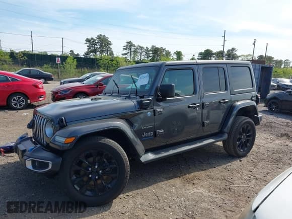 ✅ 2023 Jeep Wrangler Sahara • VIN: 1C4JJXP69PW684803 • Lot: 42214320. Listed on IAAI with 37,723 mi. Free auction sales archive from the USA and detailed vehicle history report at DreamBid. Image 14.