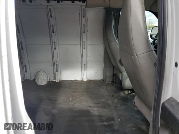 ✅ 2018 Chevrolet Express Cargo • VIN: 1GCWGBFP1J1340565 • Lot: 82257055. Listed on Copart with 228,369 mi. Free auction sales archive from the USA and detailed vehicle history report at DreamBid. Image 11.