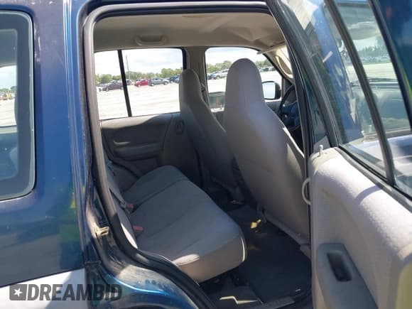 ✅ 2002 Jeep Liberty Sport • VIN: 1J4GK48K12W336241 • Lot: 42961688. Listed on IAAI with 57,681 mi. Free auction sales archive from the USA and detailed vehicle history report at DreamBid. Image 8.