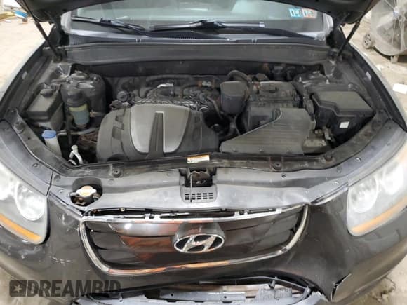 ✅ 2011 Hyundai Santa Fe SE • VIN: 5XYZHDAG8BG061824 • Lot: 77025964. Listed on Copart with 149,741 mi. Free auction sales archive from the USA and detailed vehicle history report at DreamBid. Image 12.