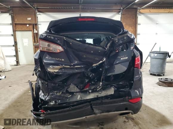 2016 Hyundai Santa Fe with VIN 5XYZUDLB7GG375971, listed as a Copart auction lot 86792085 with 99,975 mi miles and Salvage title. Bid and sale history available at DreamBid. Image 6.